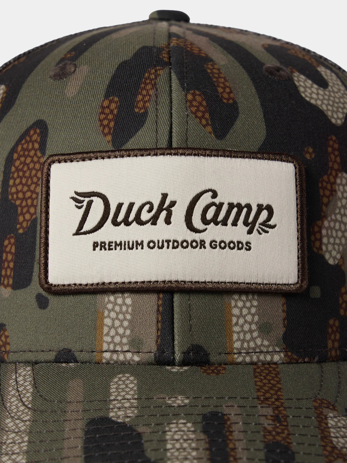 Duck Camp Trucker Hat in Woodland Camo